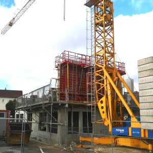 Construction d'un bâtiment pour l'école avec cour attenante